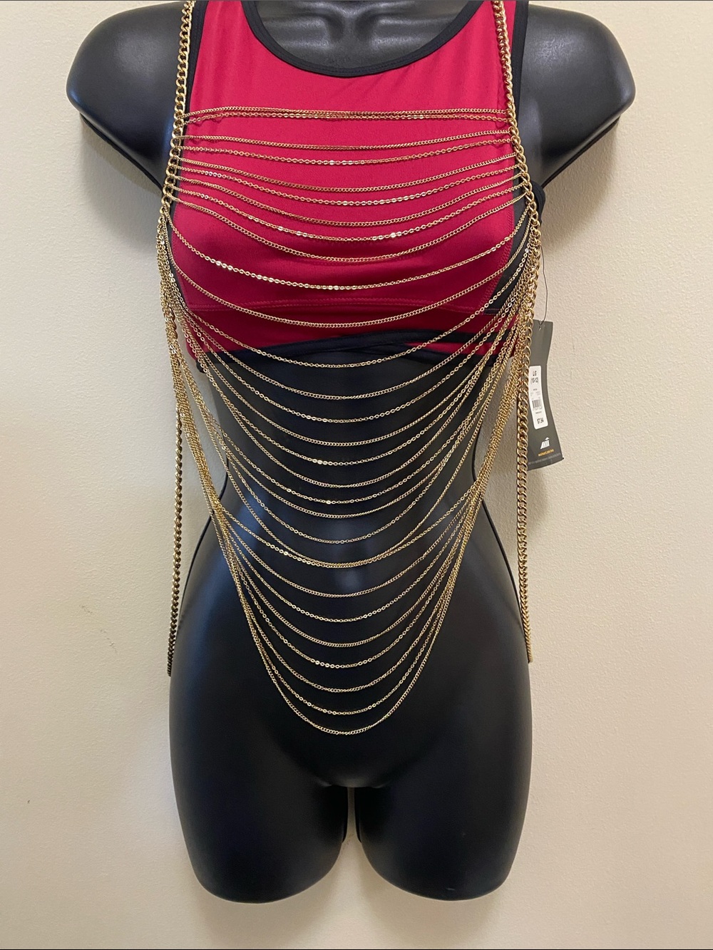 Gold tone body jewelry layered